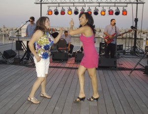 Concert Attendees Dance to Los Ciegos del Barrio