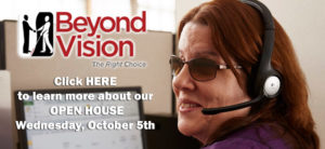 Image of a blind woman smiling wearing a phone headset in front of a computer. Text says - click here to learn more about out open house.