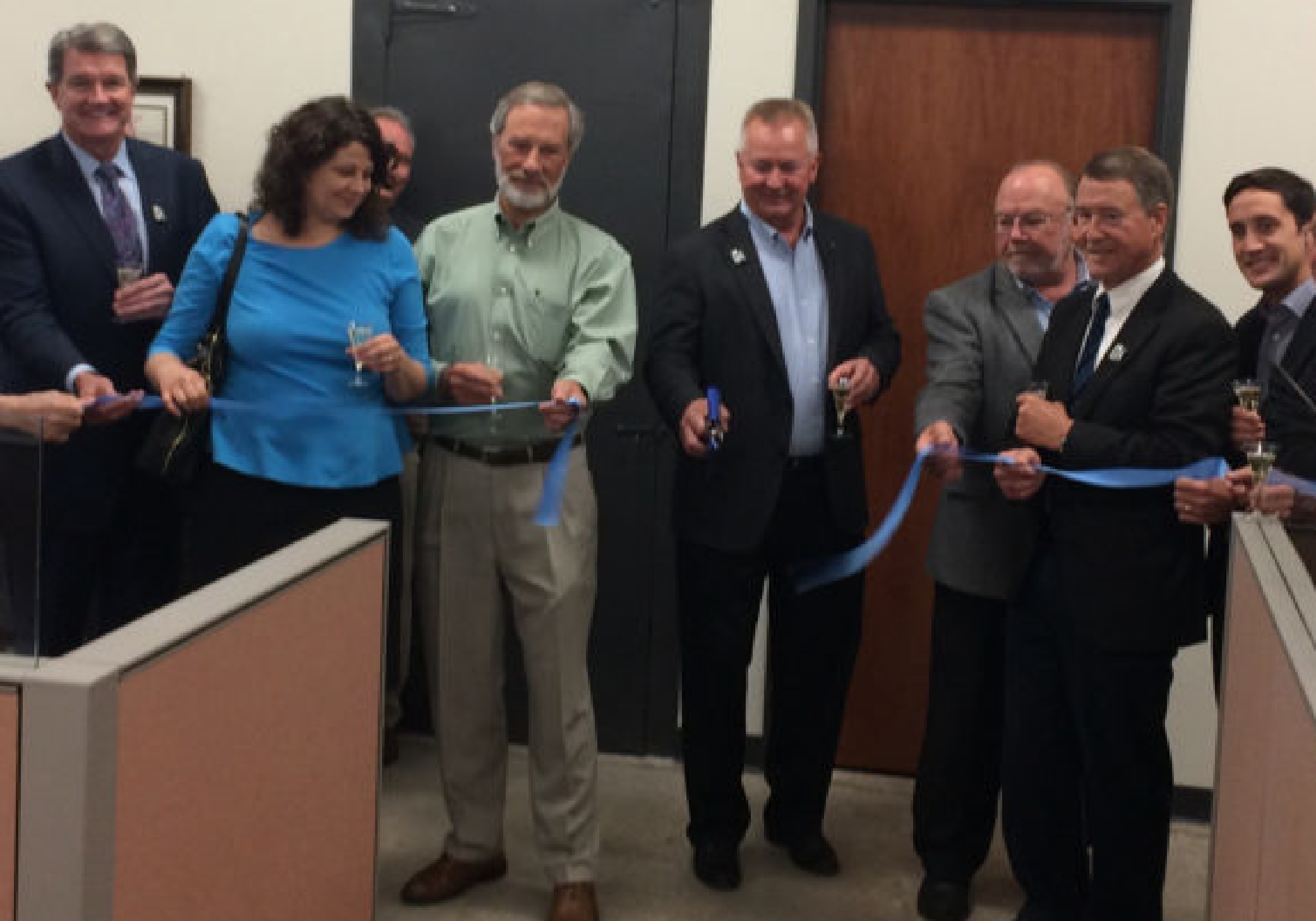 Ribbon cutting for Beyond Vision's new call center.