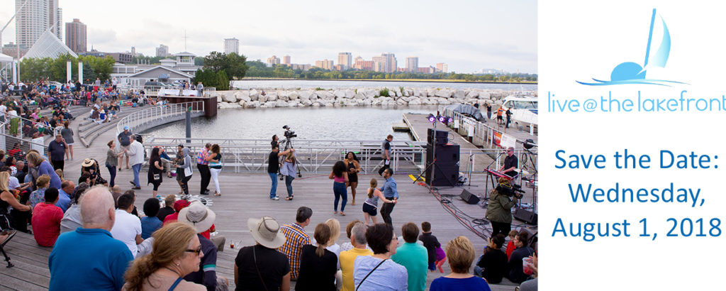Live at the Lakefront - save the date - Wednesday, August 1, 2018.In front of a band of musicians who are blind, a large crowd of people watches and many are salsa dancing.