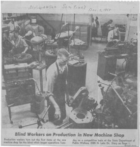 B&W newspaper clipping from the Milwaukee Sentinel, December 3, 1958. Men around various machines, with work aprons on. "Blind Workers on Production in New Machine Shop"