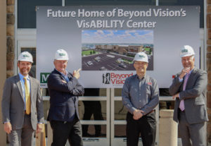 Beyond Vision CEO Jim Kerlin with CFO Dennis Martin and PNC bank representatives