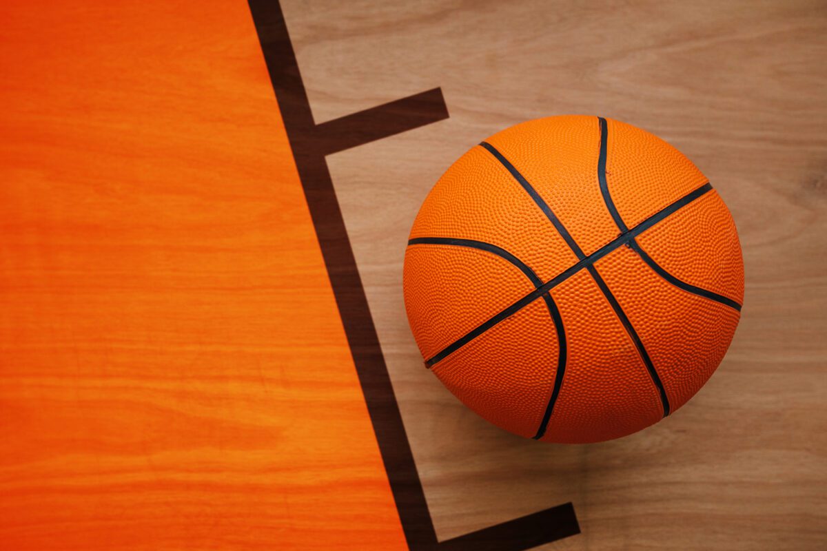 Basketball ball on court floor